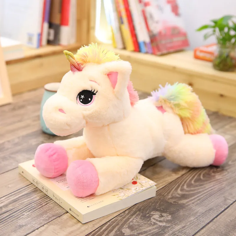 Lucky Star Cuddles a Unicorn Rainbow Horse