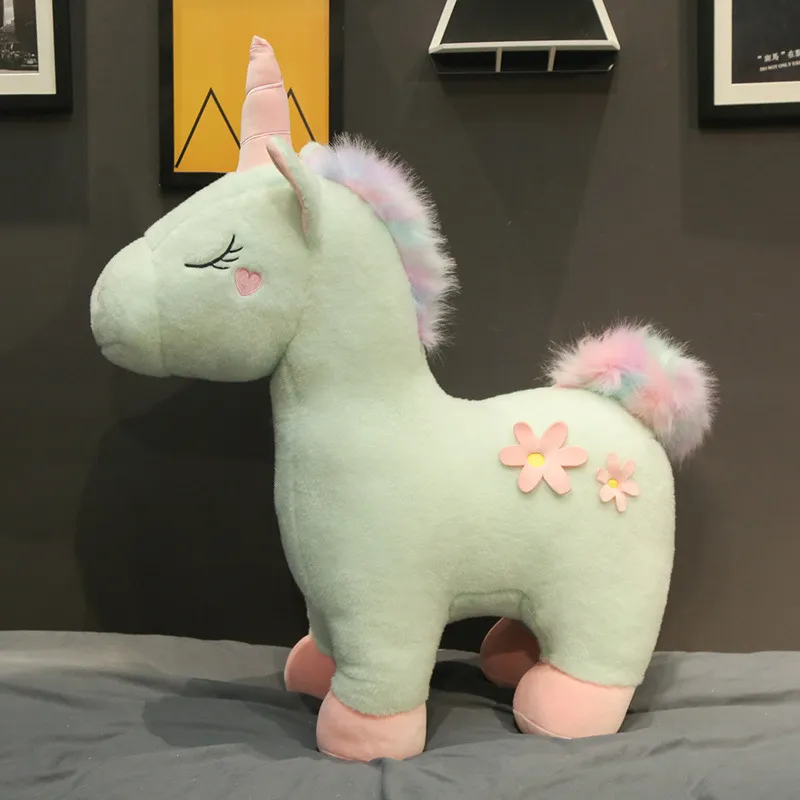Lucky Star Cuddles a Unicorn Rainbow Horse
