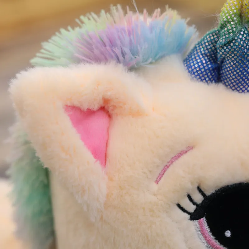 Lucky Star Cuddles a Unicorn Rainbow Horse