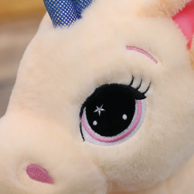 Lucky Star Cuddles a Unicorn Rainbow Horse